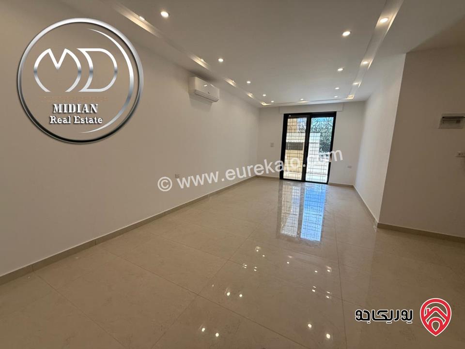 شقة فارغة أرضية مساحة 125م مع ترس 40م للايجار في عمان - عبدون جديدة لم تسكن