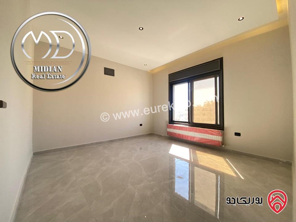 شقة ارضية جديدة للبيع في عمان - تلاع العلي مساحة 210م مع ترس و حديقة 140م تشطيبات ديكورات عصرية فاخرة بسعر مميز