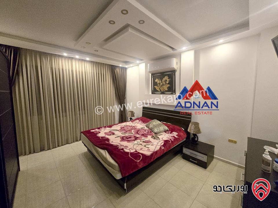 شقة أرضية مساحة 185م داخلي مع حديقة كبيرة 400م و كراج ومدخل خاص مفروشة للإيجار في عمان - الصويفية