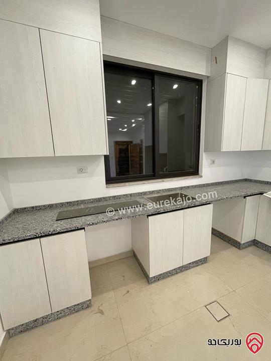 شقة طابق اول جديدة مساحة 100م لم تسكن للايجار في عمان - عبدون