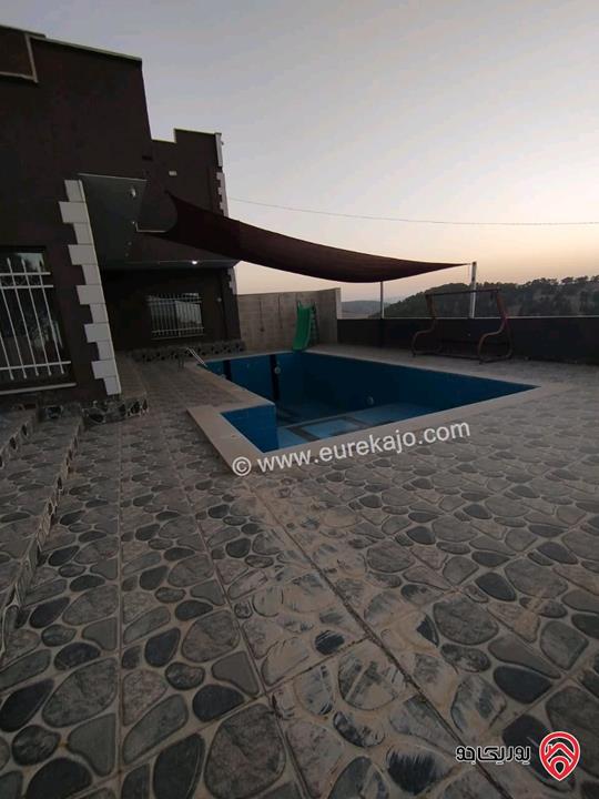 مزرعة مساحة الأرض 4 دونمات مع شاليه 250م للبيع في جرش خلف جامعة فيلادلفيا