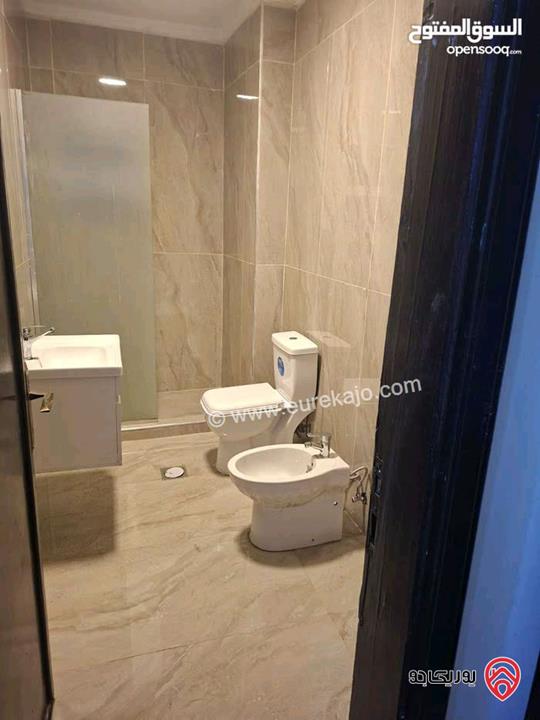 شقة فارغة طابق اول مساحة 105م للإيجار في عمان - الرابية 