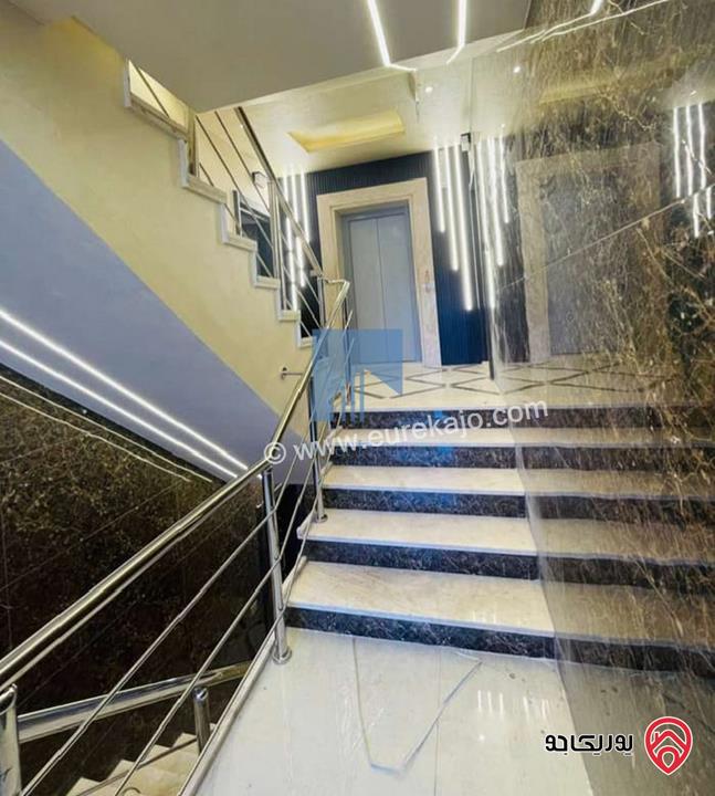 شقة أرضية فاخرة للبيع في عمان - تلاع العلي - خلف طواحين الهوا 180م مع ترس 40م لم تسكن