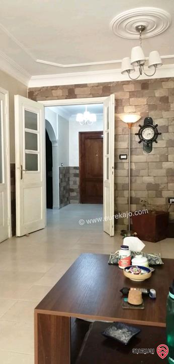 شقة فاخرة مفروشة مساحة 200م شبه ارضي معلقة على منسوب للبيع في عمان - الدوار السابع قرب سمارت باي 