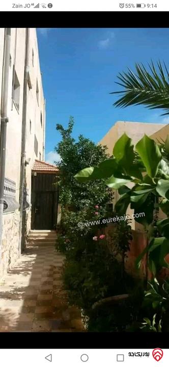 بناية سكنية مؤلفة من 3 طوابق على ارض 900م للبيع في اربد - حي الطوال 