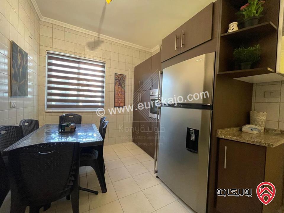 شقة فاخرة مفروشة طابق أرضي مساحة 155م داخلي و 100م خارجي للايجار في عمان - عبدون