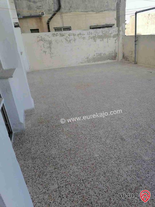 شقة شبه تسوية مساحة 110م للبيع في عمان - جبل التاج حي ام تينة