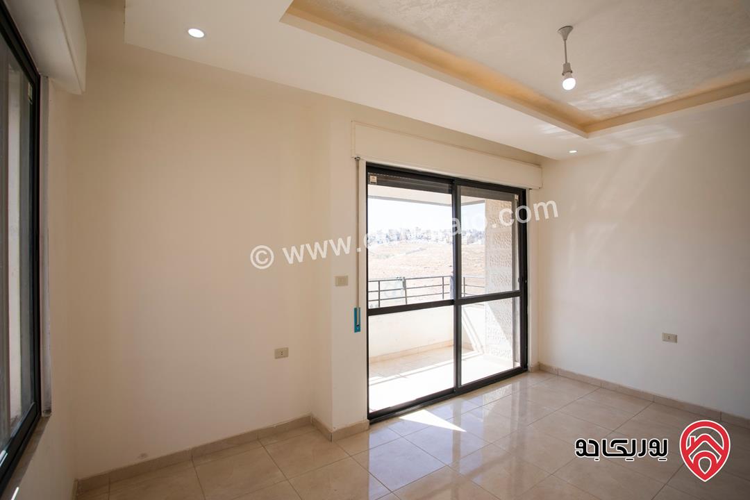 شقة طابق ثالث مع روف مساحة 135م للبيع في عمان - ابو علندا 