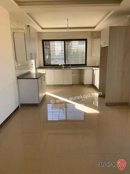 شقة فارغة شبه ارضية مساحة 160م للايجار في عمان - تلاع العلي 