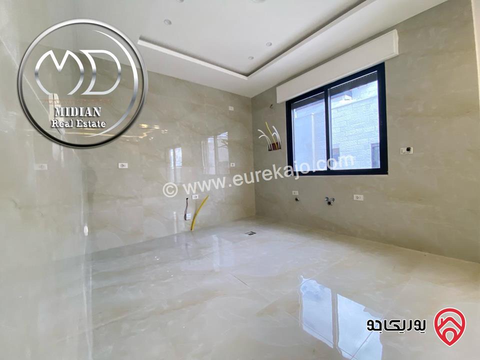 شقق أرضية جديدة للبيع في عمان - خلدا مساحات 140م & 145م مع تراسات و حدائق تشطيبات ديكورات سوبر ديلوكس بسعر مميز