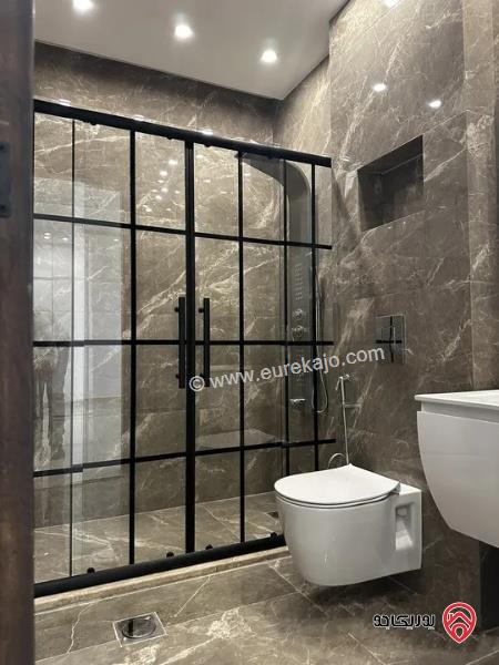 شقة فاخرة أرضية مساحة 160م داخلي و 60م ترس للبيع في عمان - تلاع العلي