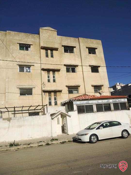 عمارة مكونة من 8 شقق مساحة الأرض 662 متر - عمر البناء 30 عام للبيع في عمان - حي الصحابة - دخلة عميش