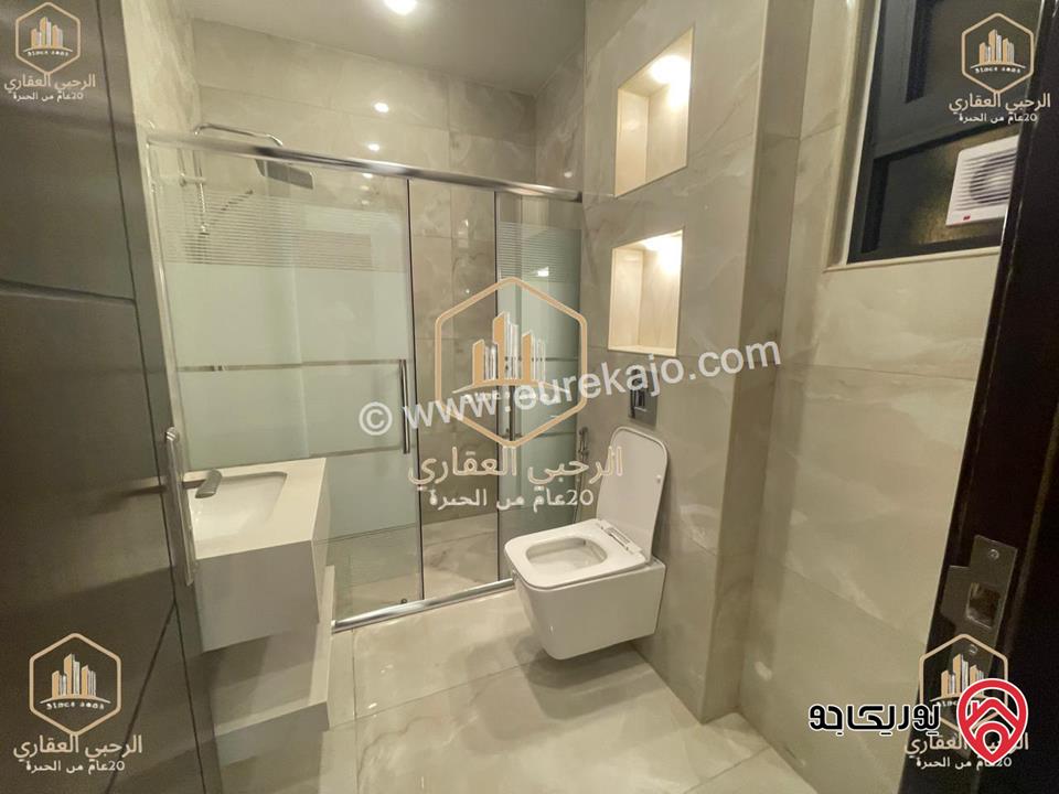 شقة ارضية جديدة مساحة 150م داخلي و 50م خارجي للايجار في عمان - الجندويل 