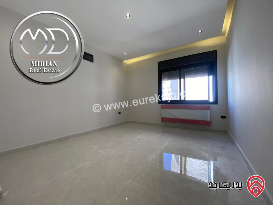 شقة ارضية جديدة للبيع في عمان - تلاع العلي مساحة 210م مع ترس و حديقة 140م تشطيبات ديكورات عصرية فاخرة بسعر مميز