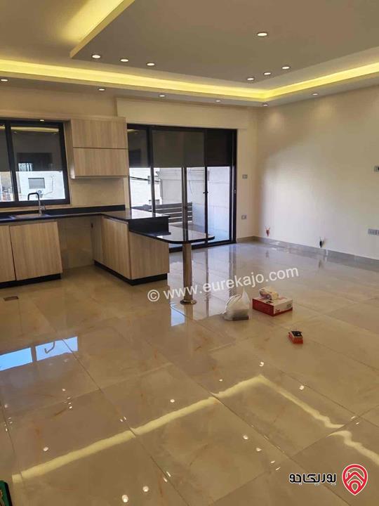 شقة طابق أول مساحة 100م للايجار في عمان - الجبيهة 