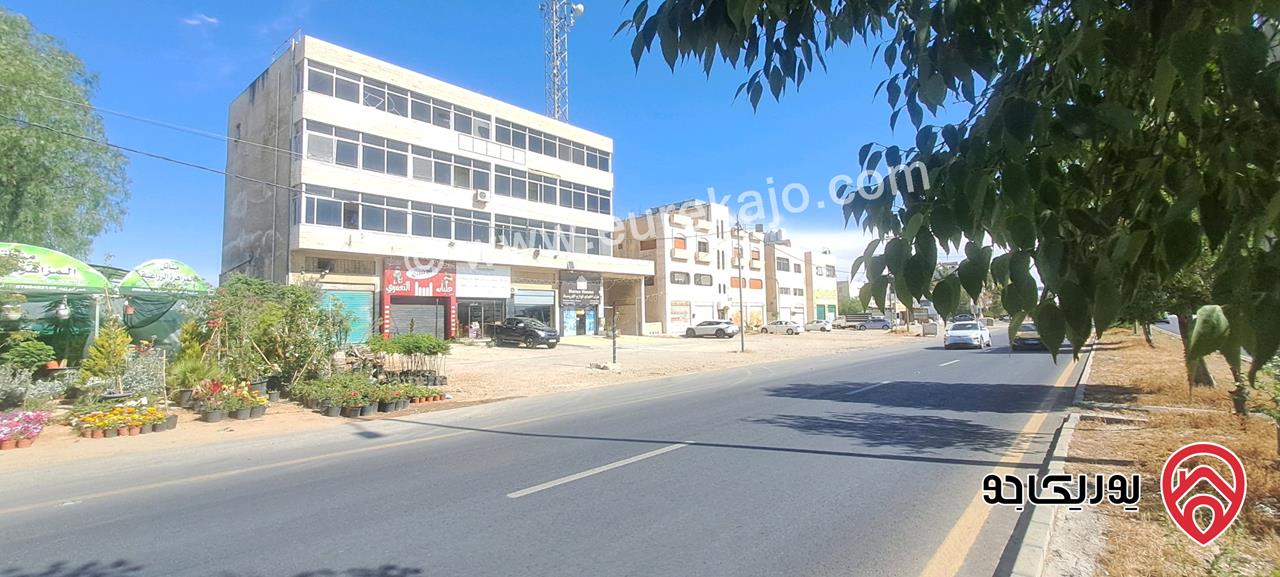 مجمع على أرض مساحة 1 دونم و 77م للبيع في عمان - طريق المطار جسر مادبا
