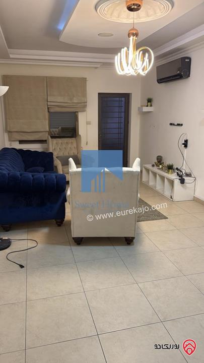 شقة أرضية  فاخرة للبيع في عمان - الدوار السابع 91م مع ترسات 90م بسعر مغري