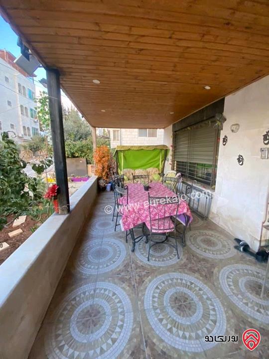 شقة أرضية مساحة 186م داخلي و 30م خارجي للبيع مفروشة في عمان - الجندويل