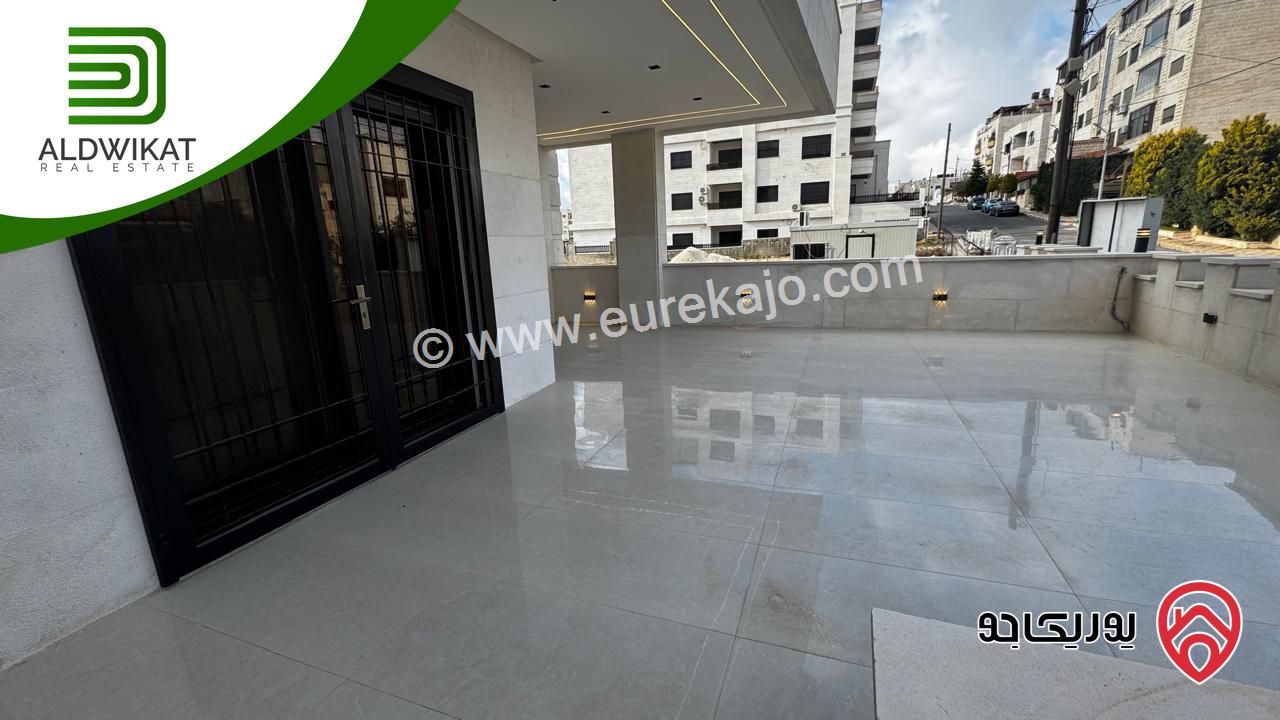 شقة ارضية للبيع في عمان - خلدا مساحة البناء 250 م والترس 80م موقع مميز واطلالة