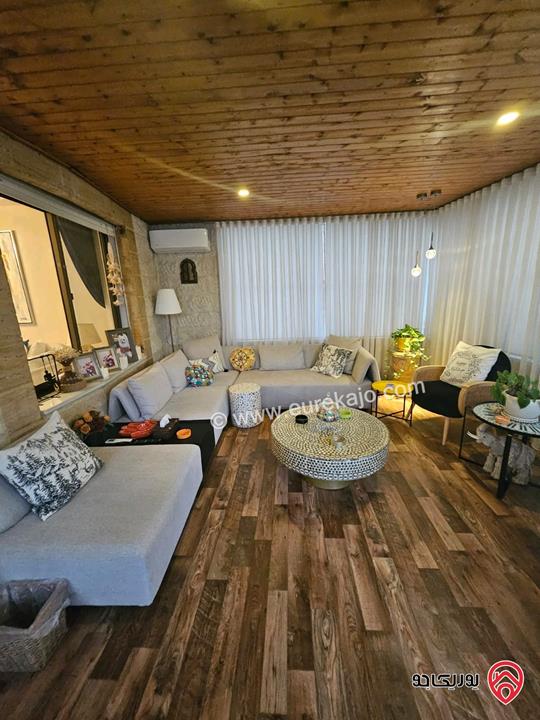 شقه طابق ارضي مساحة 150م مع حديقة 100م للبيع في عمان - الرابية 