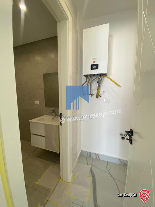 شقة فاخرة للبيع في عمان - أم السماق الشمالي خلف جامع التلاوي طابق ثالث 210م مع روف دوبلكس 120م لم تسكن