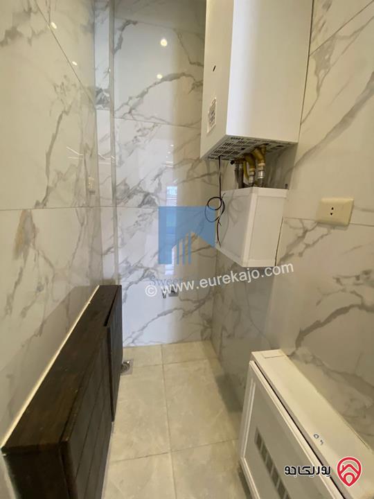 شقة أرضية 170م مع ترس 100م تشطيب سوبر ديلوكس لم تسكن للبيع في عمان - تلاع العلي