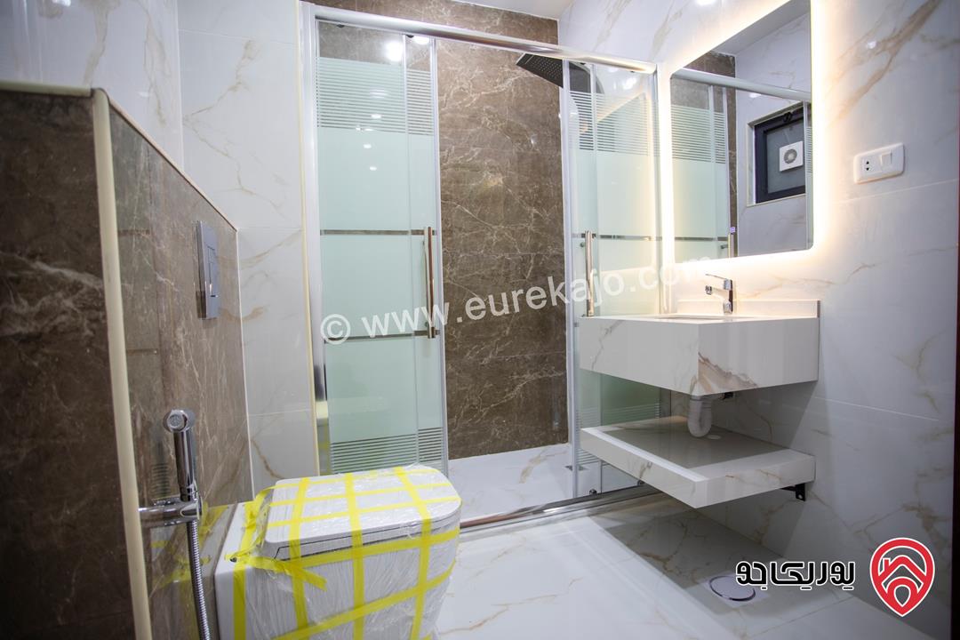 شقة طابق ارضي مساحة 150م مع كراج و مدخل مستقل تشطيب فاخر للبيع في عمان - ضاحية الرشيد 