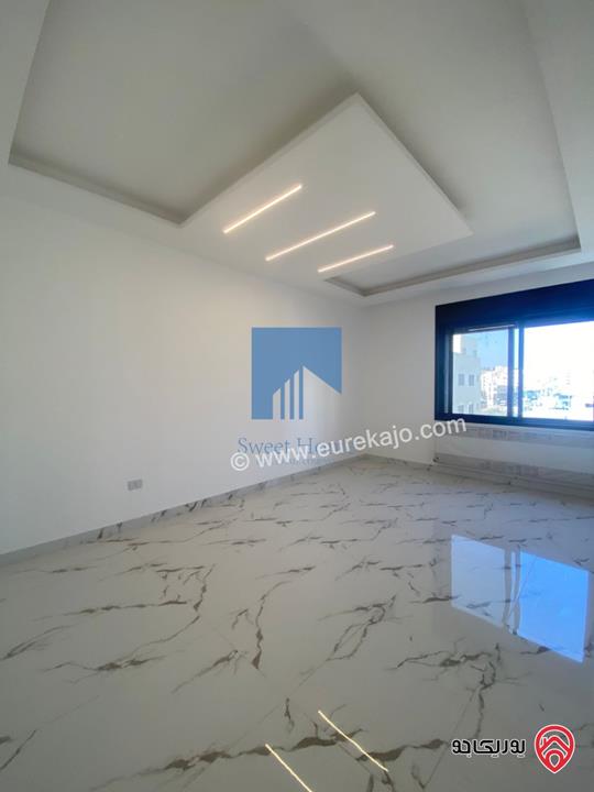 شقة فاخرة للبيع في عمان - خلدا قرب إشارة البنك العربي ومركز زها طابق ثاني 220م تشطيب سوبر ديلوكس لم تسكن