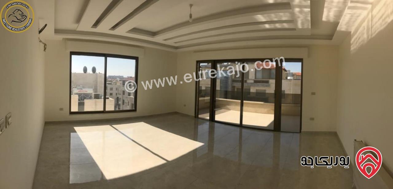 شقة فاخرة للبيع في عمان - خلدا - العوجانية قرب الهمشري طابق ثالث 200م مع روف دوبلكس 140م لم تسكن