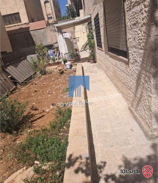 شقة مميزة شبه أرضية مساحة 90م مع حديقة وترسات 120م للبيع في عمان - خلدا