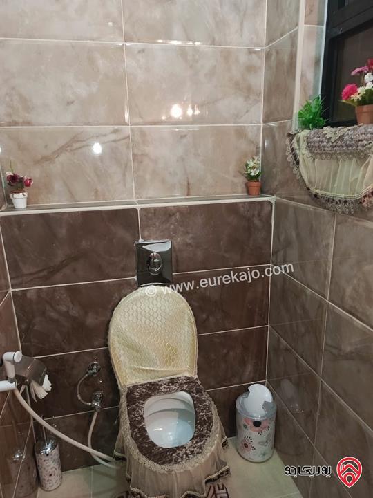شقة سوبر ديلوكس طابق أرضي مساحة 145م مسطح بناء + ترسات 110م للبيع في عمان - طريق المطار 