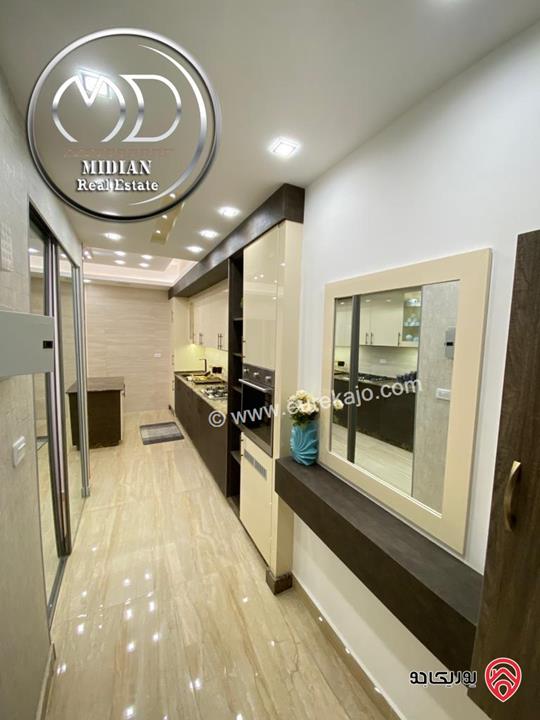 شقق مفروشة للايجار في عمان - ام السماق مساحات 100م تشطيبات و ديكورات فاخرة فرش فندقي اطلالة جميلة بأسعار مميزة