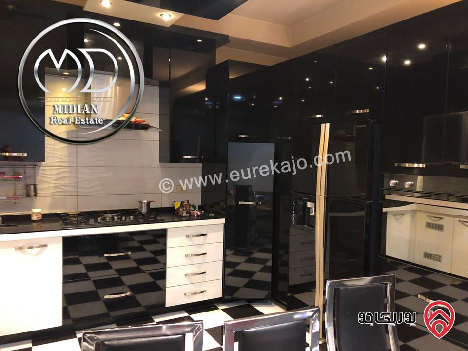 شقة ارضية مساحة 240م مع ترس 50م للبيع عمان - دير غبار تشطيبات و ديكورات فاخرة بسعر مميز جداً