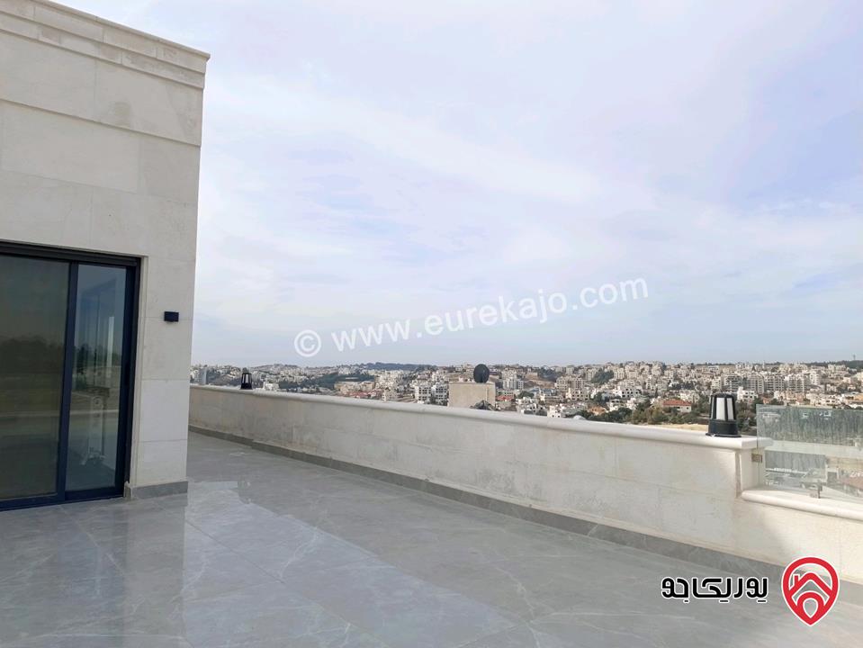 روف طابقي مميز مساحة البناء 155م والترسات 188م للبيع في عمان - دابوق