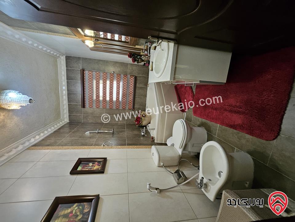 شقة مساحة 180م طابق ثاني للبيع في عمان - ام اذينة تشطيبات سوبر ديلوكس اطلالة على الابراج