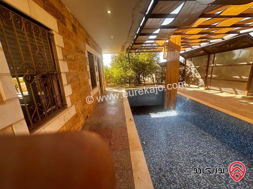 مزرعة فيها فيلا عدد 2 مساحة كل فيلا 300م على أرض 14 دونم للبيع في جرش