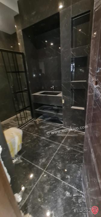 شقة طابق أول مساحة 220م للبيع في عمان - الدوار السابع موقع رائع تشطيبات فاخرة 