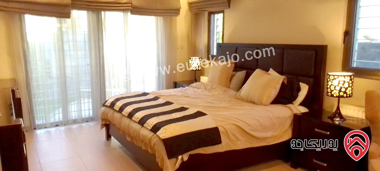 شقة أرضية مفروشة فخمة مساحة 220م مع حديقة كبيرة 350م و كراج و مدخل خاص للإيجار في عمان - الرابية