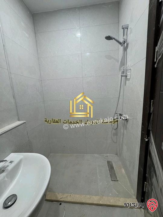 شقة جديدة لم تسكن طابق ارضي مساحة 125م للإيجار في عمان - مرج الحمام 