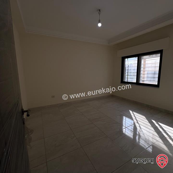 شقة شبه أرضية مساحة 188م داخلي و 165م خارجي للبيع في عمان - ضاحية النخيل