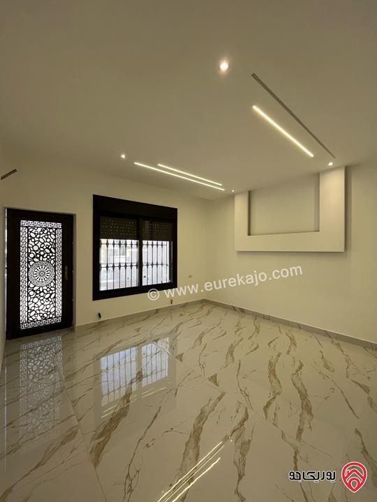 شقة شبه أرضية مساحة 100م للبيع في عمان - طبربور 